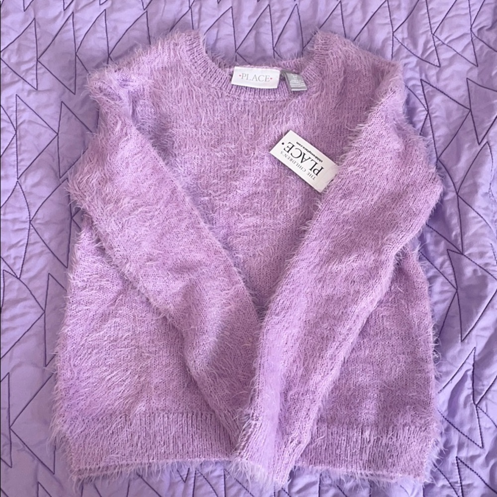 Girl’s fuzzy sweater